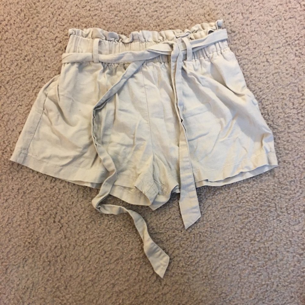 Have tie waist linen-blend tan shorts